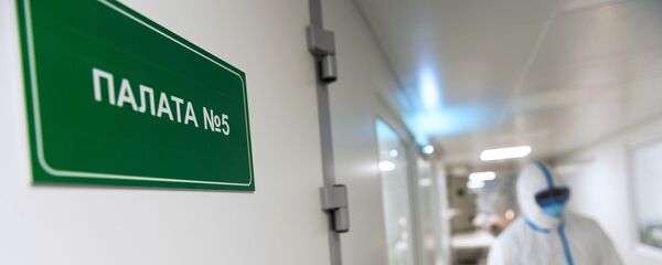 Медыцынскі работнік у інфекцыйнай бальніцы, архіўнае фота Медыцынскі работнік у інфекцыйнай бальніцы, архіўнае фота - Sputnik Беларусь