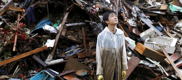 Из-за наводнения в Японии разрушены тысячи домов - Sputnik Беларусь