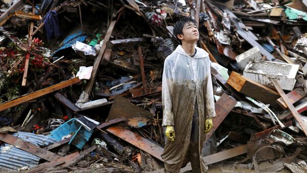 Из-за наводнения в Японии разрушены тысячи домов - Sputnik Беларусь