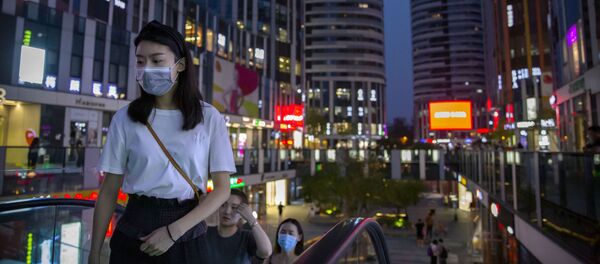 Практически все в Китае сейчас носят медицинские маски Практически все в Китае сейчас носят медицинские маски - Sputnik Беларусь