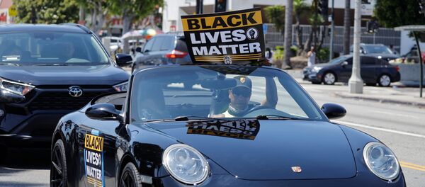 Акция протеста в рамках общенациональной забастовки за расовое равенство в Лос-Анджелесе - Sputnik Беларусь