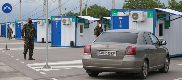 Контрольно-пропускной пункт в поселке Еленовка в Донецкой области на границе ДНР и Украины - Sputnik Беларусь