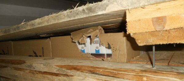 Контрабандные сигареты в досках Контрабандные сигареты в досках - Sputnik Беларусь