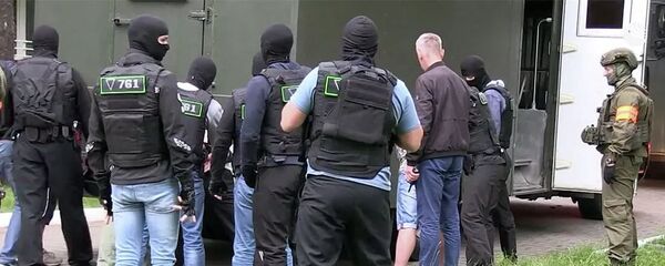 Кадр оперативной съемки задержания группы россиян в санатории под Минском - Sputnik Беларусь