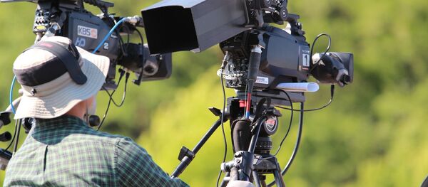 Видеооператор с камерой - Sputnik Беларусь
