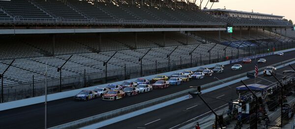 Трибуны трассы в Индианаполисе, архивное фото Трибуны трассы в Индианаполисе, архивное фото - Sputnik Беларусь
