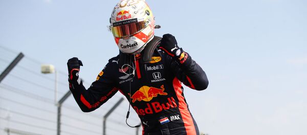 Победитель Гран-при 70-летия Макс Ферстаппен - Sputnik Беларусь