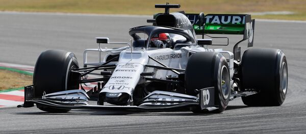 Россиянин Даниил Квят во время Гран-при Испании Россиянин Даниил Квят во время Гран-при Испании - Sputnik Беларусь