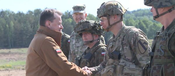 Напряженность у границ: зачем США отправляют войска в Польшу - видео Напряженность у границ: зачем США отправляют войска в Польшу - видео - Sputnik Беларусь