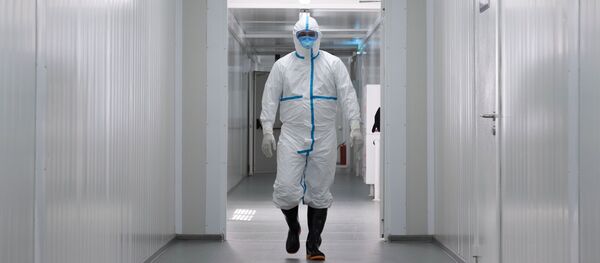 Медицинский работник в больнице, архивное фото - Sputnik Беларусь