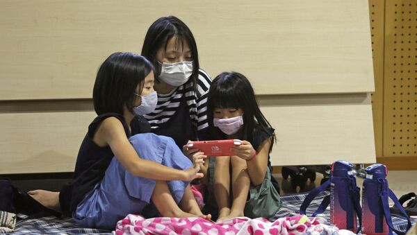 Жители Японии эвакуируются из-за тайфуна - Sputnik Беларусь