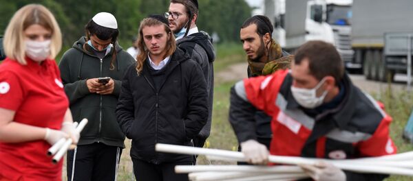 Красный Крест привез помощь израильтянам на белорусско-украинской границе Красный Крест привез помощь израильтянам на белорусско-украинской границе - Sputnik Беларусь