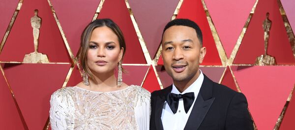 Американский певец Джон Ледженд  и его жена - американская модель Крисси Тейген - Sputnik Беларусь