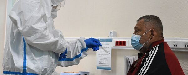 В приемном отделении госпиталя COVID-19 городской клинической больницы № 52 в Москве - Sputnik Беларусь