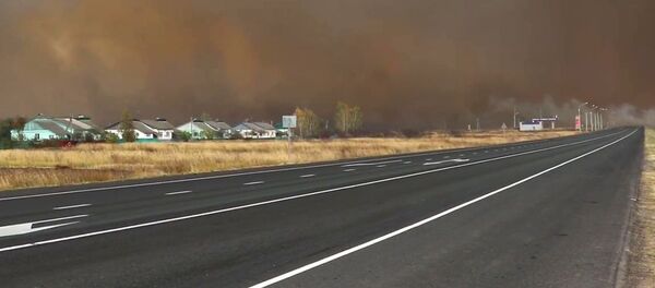 Дым от взрывов на бывших военных складах в Рязанской области Дым от взрывов на бывших военных складах в Рязанской области - Sputnik Беларусь