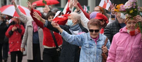 Пенсіянеры падчас акцыі Пенсіянеры падчас акцыі - Sputnik Беларусь