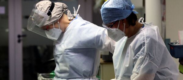 Медыкі ў аддзяленні для хворых на каронавірус у Бельгіі - Sputnik Беларусь