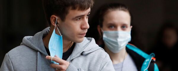 Людзі ў масках Людзі ў масках - Sputnik Беларусь