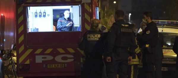 Полиция на месте нападения на священника во французском Лионе Полиция на месте нападения на священника во французском Лионе - Sputnik Беларусь