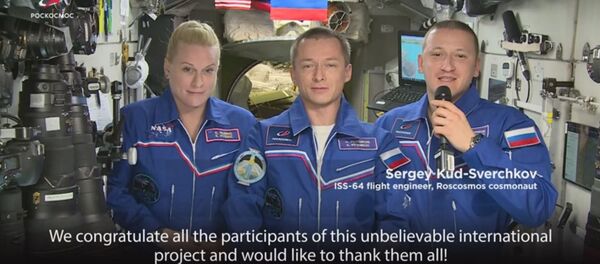 Экипаж МКС записал поздравление, посвященное 20-летию ее заселения - видео - Sputnik Беларусь