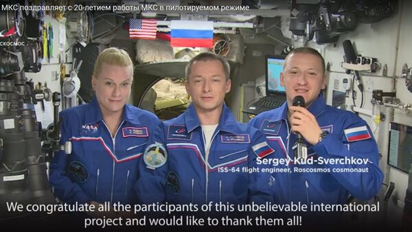 Экипаж МКС записал поздравление, посвященное 20-летию ее заселения - видео - Sputnik Беларусь
