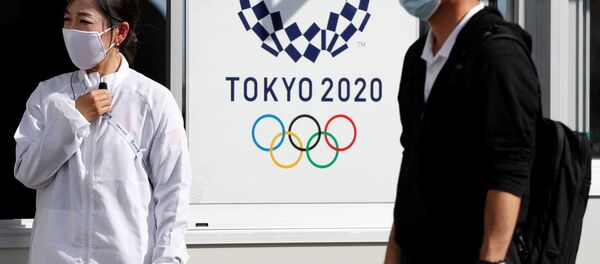 Официальные лица, исполняющие роль зрителей, проводят тестовую сессию Олимпийских игр в Токио - Sputnik Беларусь