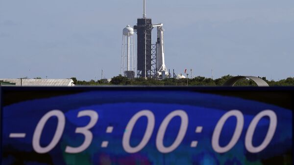 Табло временем, оставшимся до запуска ракеты Falcon 9 с кораблем Crew Dragon - Sputnik Беларусь