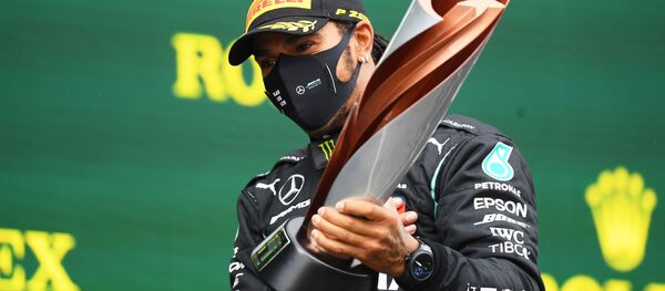 Британский гонщик Mercedes Льюис Хэмилтон Британский гонщик Mercedes Льюис Хэмилтон - Sputnik Беларусь