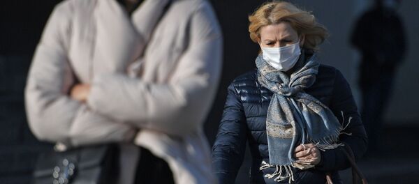 Жанчына ў ахоўнай масцы - Sputnik Беларусь