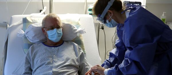 Осмотр больного коронавирусом - Sputnik Беларусь