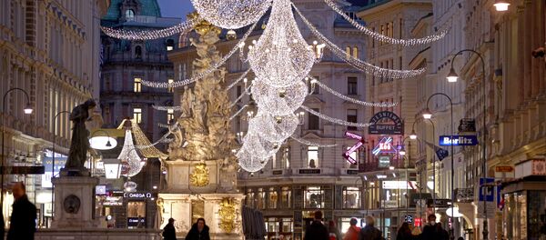 Рождественские огни освещают торговую улицу Грабен Рождественские огни освещают торговую улицу Грабен - Sputnik Беларусь