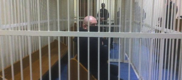  Приговоренный за вымогательство к 24 годам лишения свободы Ростислав Светчиков в зале суда - Sputnik Беларусь
