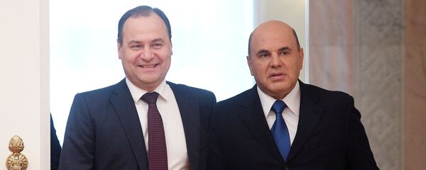 Старшыня ўрада РФ Міхаіл Мішусцін і прэм'ер-міністр Беларусі Раман Галоўчанка Старшыня ўрада РФ Міхаіл Мішусцін і прэм'ер-міністр Беларусі Раман Галоўчанка - Sputnik Беларусь