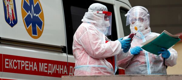 Медики в Киеве, архивное фото - Sputnik Беларусь