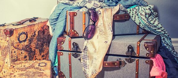 Одежда в чемодане Одежда в чемодане - Sputnik Беларусь