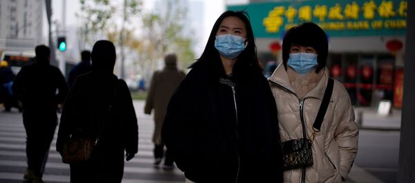Жители Китая в защитных масках - Sputnik Беларусь
