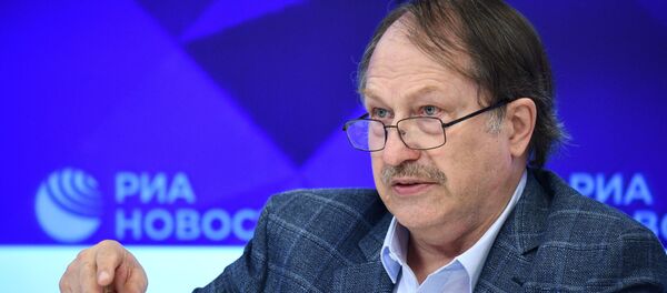 Председатель Экспертного совета Российско-китайского комитета дружбы, мира и развития, китаевед, писатель, путешественник Юрий Тавровский - Sputnik Беларусь