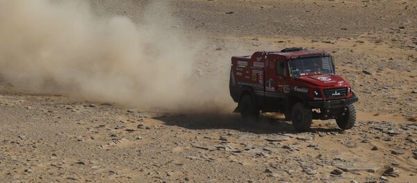 Экипаж белорусской команды МАЗ-СПОРТавто под управлением Сергея Вязовича на третьем этапе ралли-рейда Дакар-2021 - Sputnik Беларусь