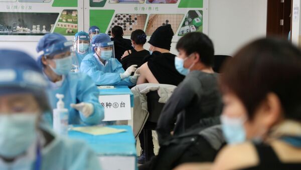 Медработники в Китае проходят вакцинацию от коронавируса - Sputnik Беларусь