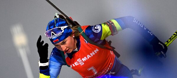 Динара Алимбекова на дистанции гонки преследования среди женщин Динара Алимбекова на дистанции гонки преследования среди женщин - Sputnik Беларусь