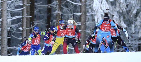 Биатлонисты на этапе одиночной смешанной эстафеты в Оберхофе, Германия, в воскресенье, 10 января 2021  - Sputnik Беларусь