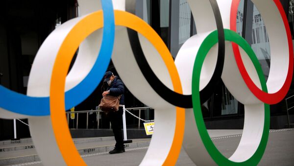 Олимпийские кольца в парке в Токио - Sputnik Беларусь