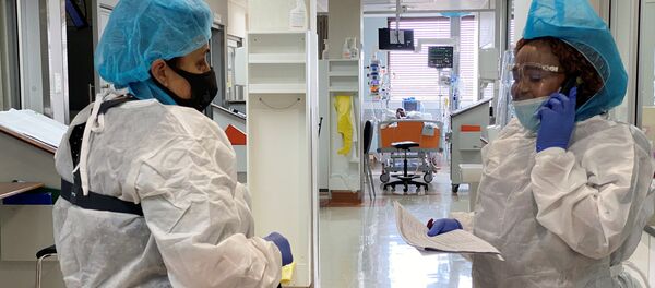 Медперсонал в больнице для коронавирусных больных в ЮАР - Sputnik Беларусь