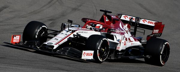 Болид команды Alfa Romeo, архивное фото Болид команды Alfa Romeo, архивное фото - Sputnik Беларусь