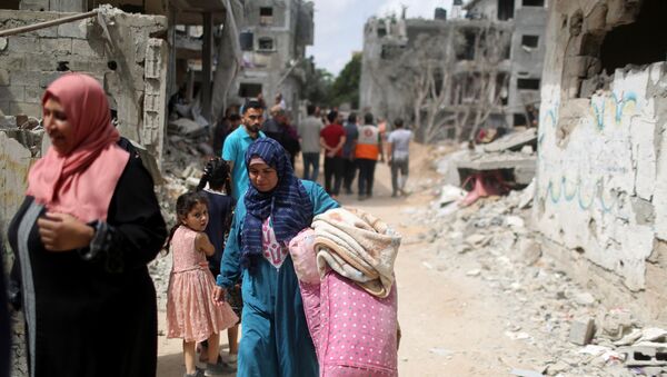 Жители Палестины возвращаются к разрушенным домам после авиаудара - Sputnik Беларусь