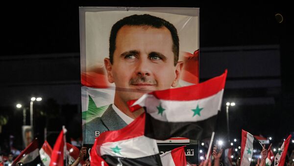 Сірыйцы святкуюць перамогу Башара Асада на выбарах прэзідэнта - Sputnik Беларусь