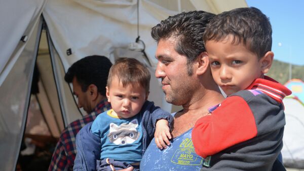 Афганские беженцы в лагере, архивное фото - Sputnik Беларусь