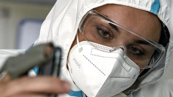 Работа медика, архивное фото - Sputnik Беларусь