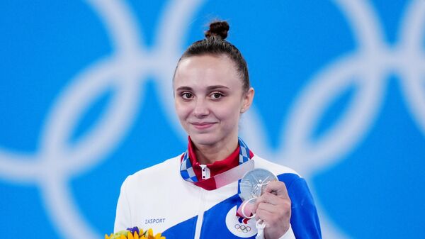 Анастасия Ильянкова, завоевавшая серебряную медаль в упражнениях на разновысоких брусьях в финале соревнований по спортивной гимнастике среди женщин на XXXII летних Олимпийских играх - Sputnik Беларусь
