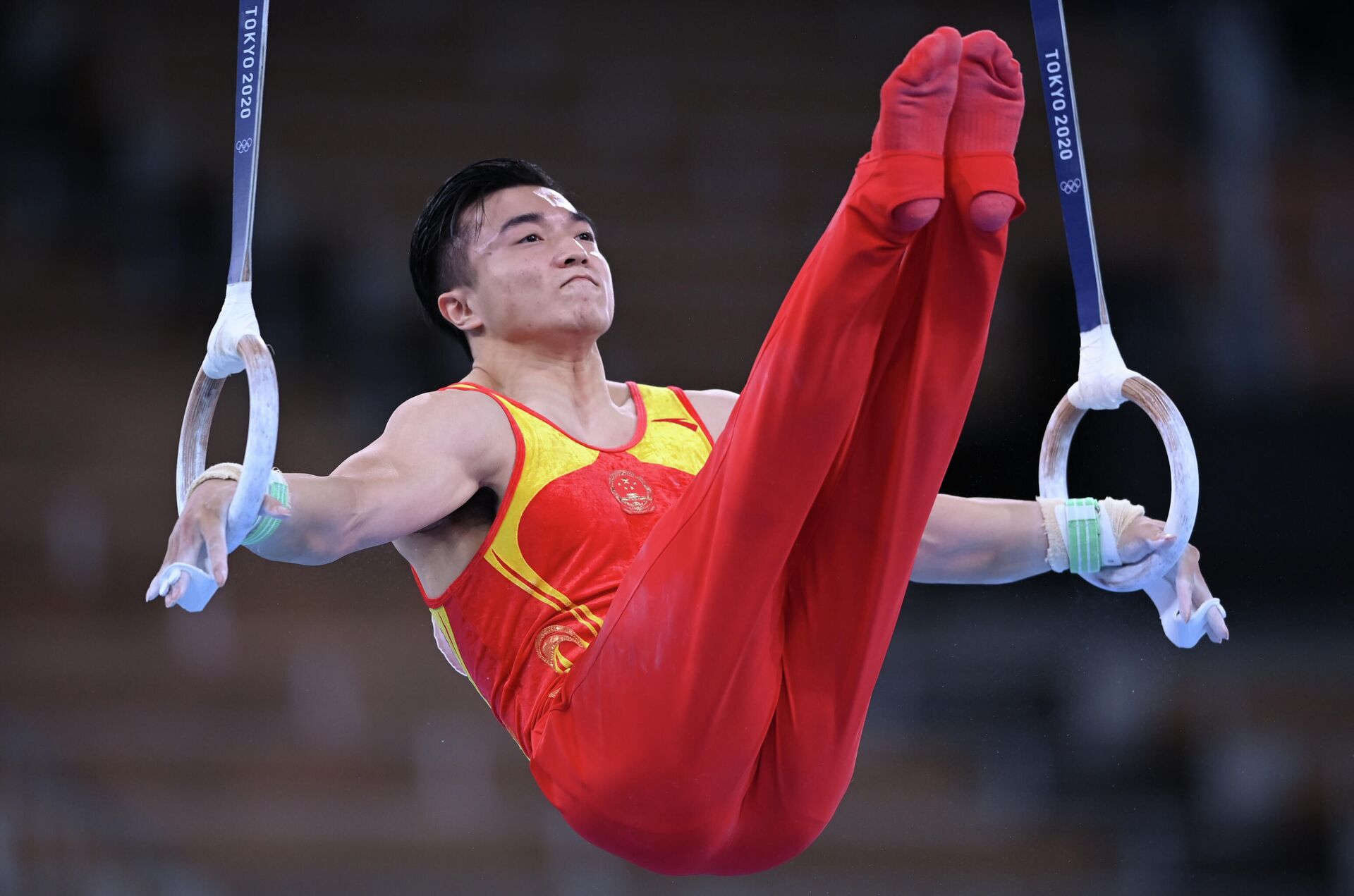 Ян Лю выполняет упражнения на кольцах в финале соревнований по спортивной гимнастике - Sputnik Беларусь, 1920, 03.08.2021